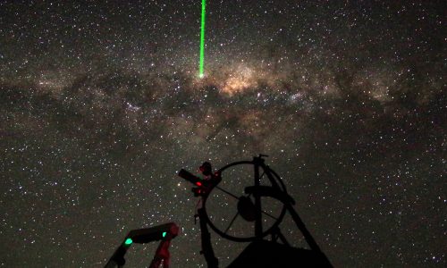 Milky Way & laser pointer over telescope