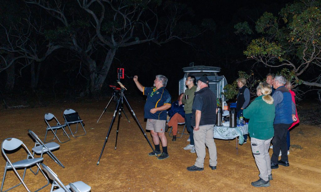 tour group with night vision equipment